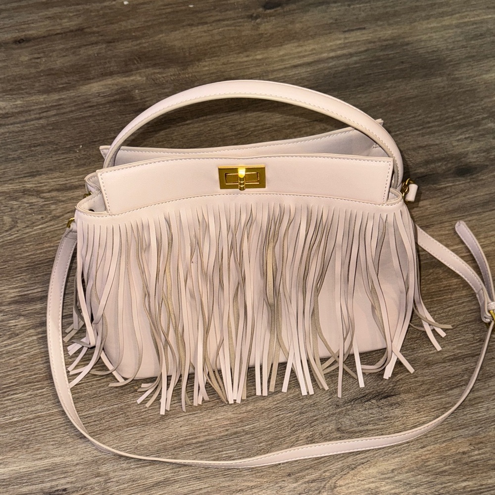 Melie Bianco Fringe Vegan Leather handbag with crossbody strap